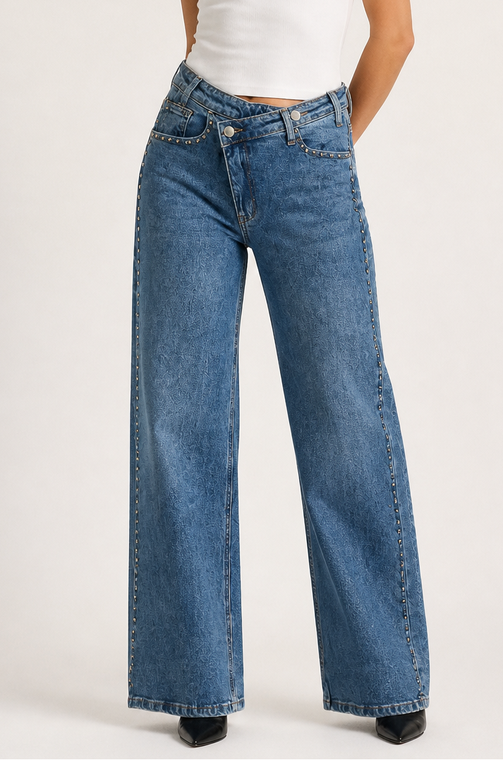 Jeans tachas cruzado